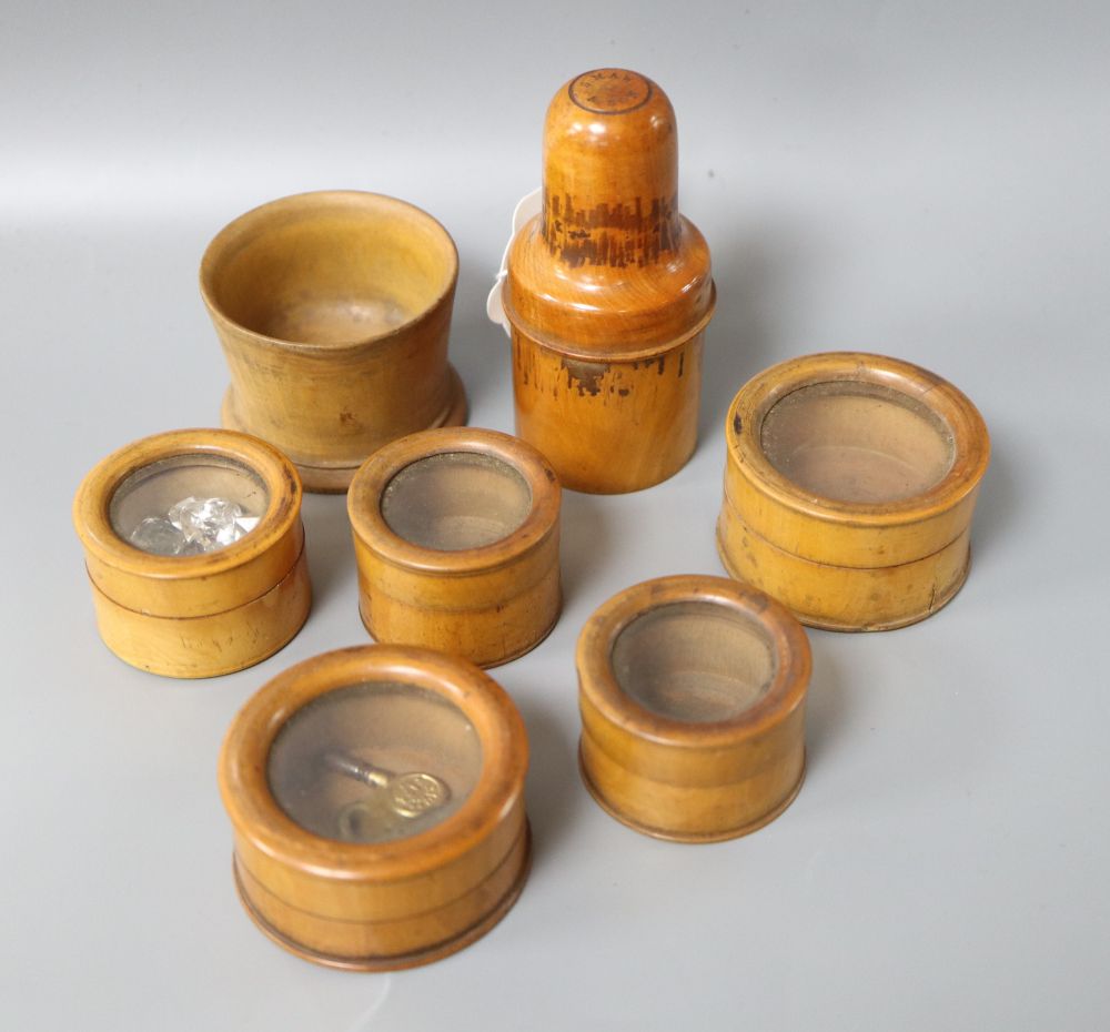 Seven Victorian boxwood chemist jars / dishes